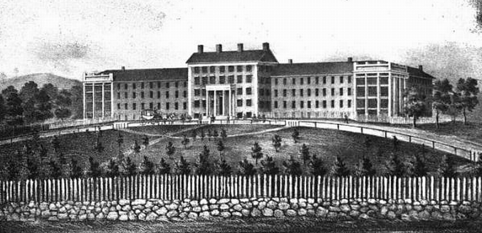 Memorial wall listing names of identified patients