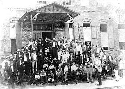 José Martí with cigar workers on the steps of the Ybor Factory in Tampa, 1893